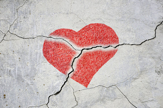 Crackles stone board, image of a red heart for Valentine`s day. L