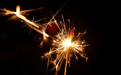 Fototapeta premium fire spark with black background.