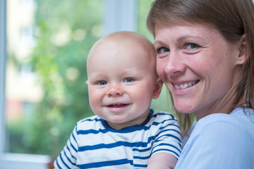 Mother with baby at home