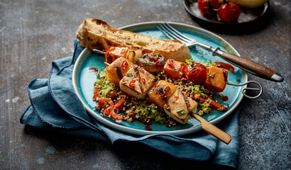 Tofu and vegetable kebabs with toasted baguette