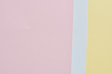 pastel ,soft two tone color or pink and yellow,  paper as texture fashion background, flat lay