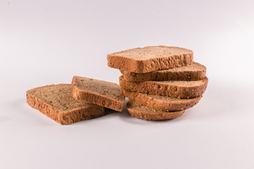 Brown bread slices in a pile