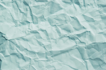 crumbled paper in soft pastel blue green color tone