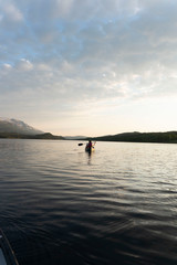 small canoe on calm lake