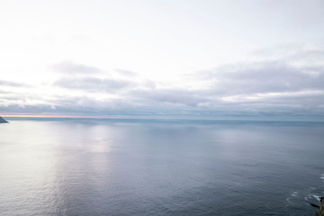 white clouds over open ocean