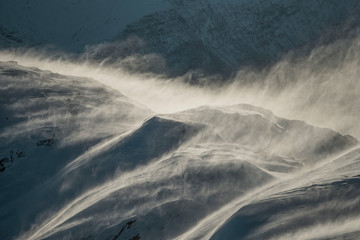 windy blowing snow on mountain