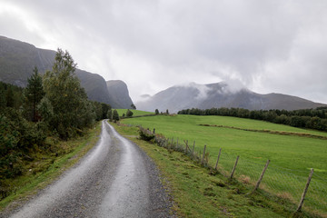 road leading to mountain scenery