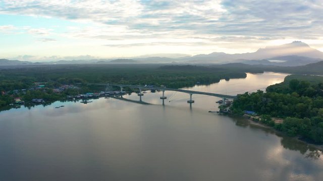 Aerial 4K footage of beautiful sunrise landscape scenery at Mengkabong River Tuaran, Sabah, Malaysia 