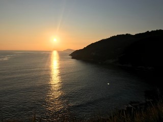Fototapeta na wymiar mare al tramonto