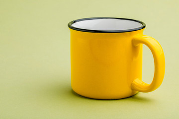 iron mug, on a green background