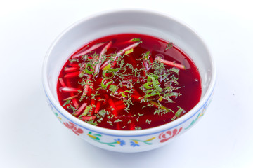 cold beetroot soup on the white background