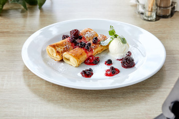 pancakes with berries and ice cream