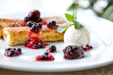 pancakes with berries and ice cream