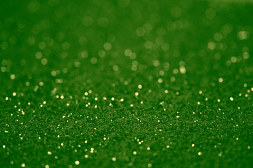 St patricks day emerald green vintage glitter defocused blurred texture christmas abstract background