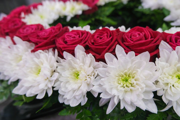Roses and chrysanthemum  flowers arrangement, white and red roses, small cute flowers.
