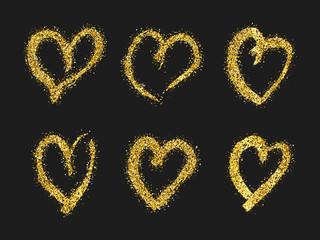 Gold glitter doodle heart on dark background