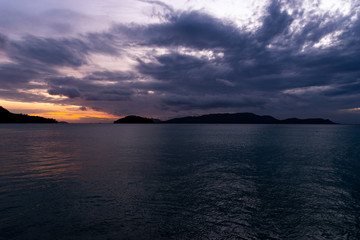 Sunrise over seychelles islands. Dark and purple sky