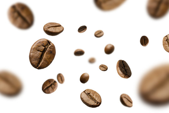 Brown roasted coffee beans falling and flying on black background.Represent breakfast for energy and freshness concept. © Muhammadsainudin