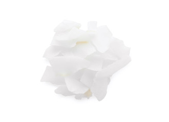 Tasty fresh coconut flakes isolated in white, top view
