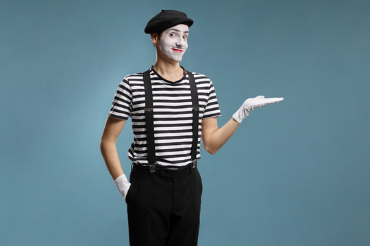 Mime showing with hand