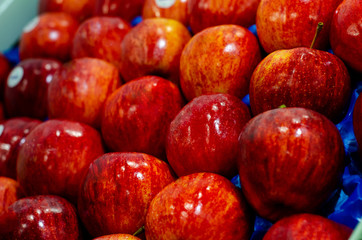 Apples in a box for sale.