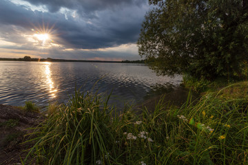 Beautiful summer landscape on the river, with beautiful evening sky.