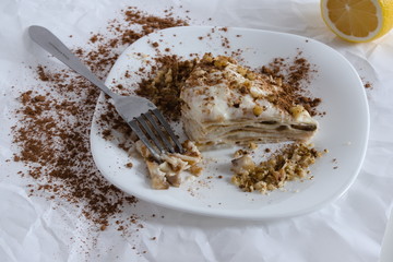 Composition a piece of cake with nut sprinkles