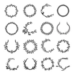 Set of hand drawn wreaths or round floral garlands