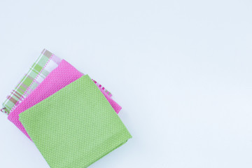 multi-colored towels on a white background