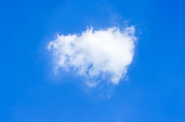 Fototapeta na wymiar beautiful single cloud on blue sky background.
