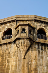 Obraz premium Jejuri, Pune, Maharashtra January 19, 2020. Colourful Temple at Jejuri near Pune India. Shree Khandoba temples wall like fort, Jejuri, Pune, Maharashtra.