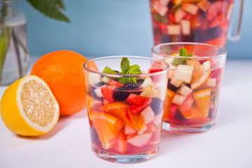Red wine fresh sangria or punch with fruits and berries.