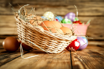 Easter eggs on wooden table and free space for your decoration. 