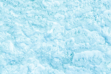 blue texture of an snow surface with pure white wave , blue cold clear cryslallized wall background...