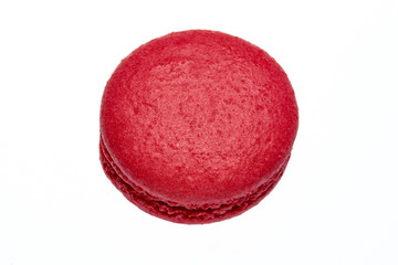 red round baked almond flour macaron isolated on a white background, delicious popular french dessert