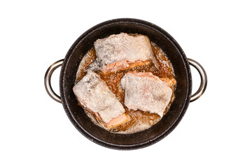Fried salmon trout fillets in a frying pan in fat, flat top view, isolated on a white background with a clipping path.