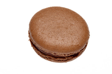 brown round baked almond flour macaron isolated on a white background, delicious popular french dessert