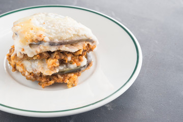 moussaka, eggplant of aubergine. In black background