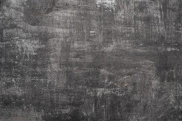 Fototapeta premium Black-and-white texture of a sheet of iron painted with paint, subject to corrosion from time.