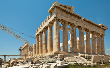 Archaeological temple of a Hellenic time with a construction equipment for restoration