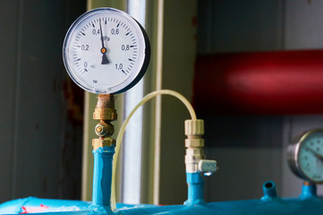 Pressure gauge showing the pressure on the water pipe.