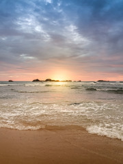 Beautiful landscape of sunrise over the cliffs in the ocean