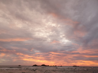 Fototapeta na wymiar Beautiful landscape of calm ocean waves and sunset sky