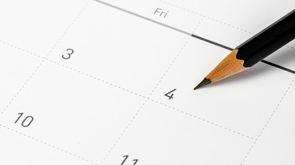 The pencil points to the 4 in the calendar.