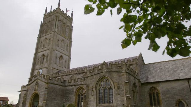 View of Church of St Mary the Virgin in Westonzoyland, showing tall tower and nice roof carving