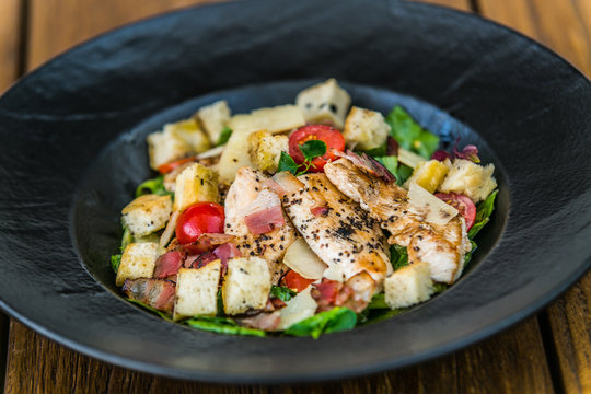 Fresh garden salad. Fresh garden salad on a plate. Fresh and healthy vegetable salad with meat