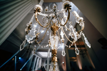 Crystal candle holder as a center piece at a wedding reception.