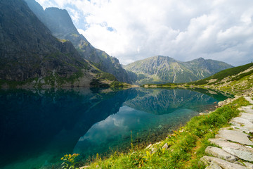 Fototapeta na wymiar Black Pond under Rysy mountain in High Tatras in Poland