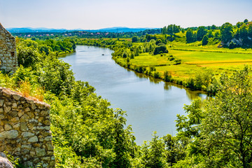 Fototapeta premium Panoramic view of the Vistula River valley underneath medieval Benedictine Abbey in Tyniec, near Cracow in Poland