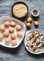 Ingredients for making orzo mushrooms pasta with teriyaki sauce chicken baked meatballs on a gray background, top view